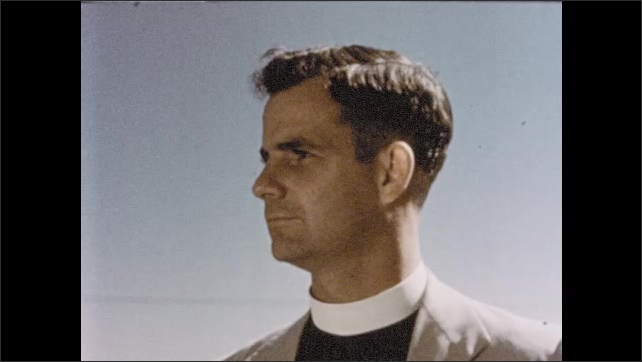 1950s: Dramatic views of grain elevator as narrator celebrates evangelical activities of Kansas bishop; car departs along rural highway.