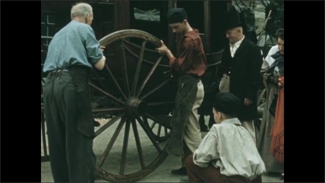 1840s: people bringing new wheel and putting it on broken cart