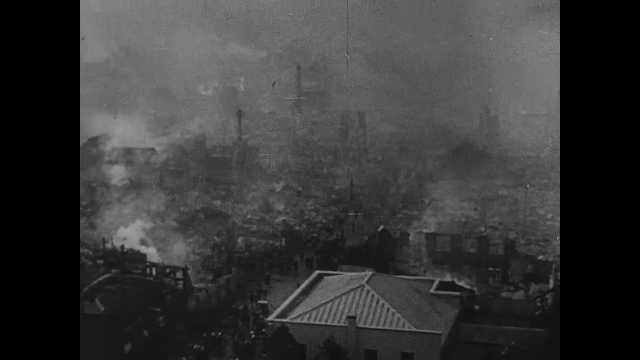 1940s China: City smolders. Map of Japanese occupation of Shanghai and Japanese movements towards Nanking. USS Panay in water.