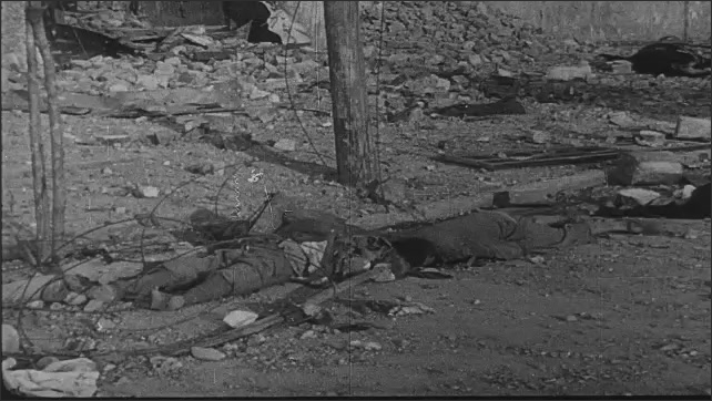 1940s China: People walk through streets strewn with bodies. Bodies of men, women and children lay in the street. Japanese military officer exits plane, walks around. 