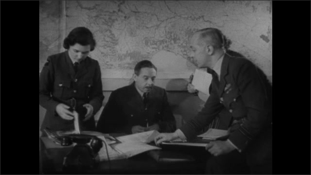 1940s ENGLAND: Man talks on phone. Men load supplies into plane. Officers seated at table talk and point at map. Map of Bremen.