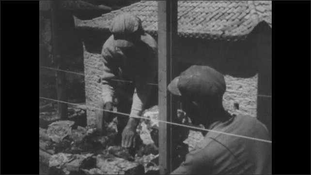 1950s Greece: Man shovels dirt into machine.  Men work on building.  Man climbs ladder carrying bag.  Masons work on wall.  Little girl smiles.