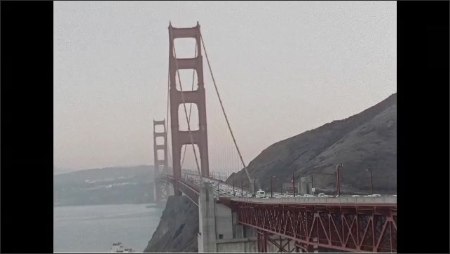 1960s: Golden Gate Bridge. Traffic on Golden Gate bridge.