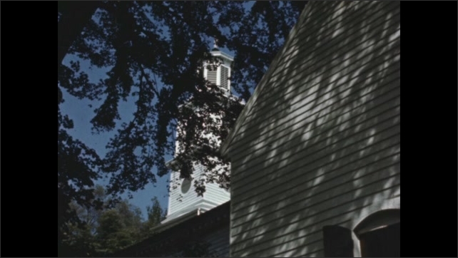 1770s: Exterior white clapboard church. 