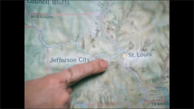 1800s: Missouri River on map of United States. Person points to St. Louis on map. Person points to Council Bluffs.