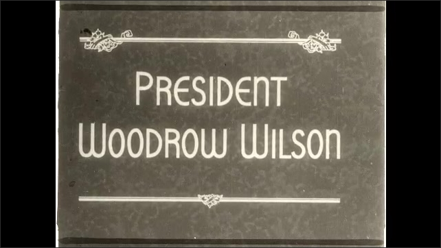 1910s: Soldiers ride on trucks through town, waving at people. Soldiers in trenches. Intertitle cards. President Woodrow Wilson sits at desk with papers.