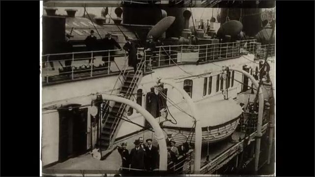 1910s: People on board deck of vessel at sea.