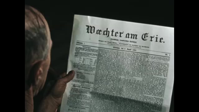 1850s: Man holds newspaper. Man writes.
