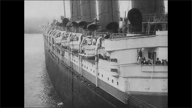 1910s: People on the deck of the Lusitania. The Lusitania sets sail.