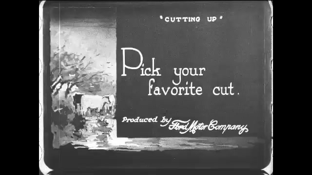 1910s: Intertitle. Diagram of various cuts of beef. Butcher moves a side of beef. Side of beef on a bench. Butcher divides side into a various cuts.