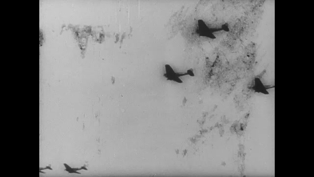 1930s Germany: Planes flying. Close up, Hermann Goering speaking. Nazi plane flying. 