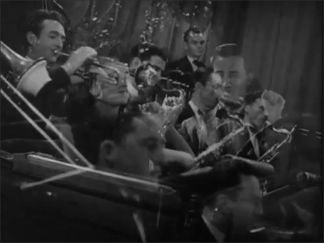 1940s: Woman dances while mopping floor. Man dances while shinning shoes. Couple dance in car. Big band plays on stage in nightclub while woman sings.
