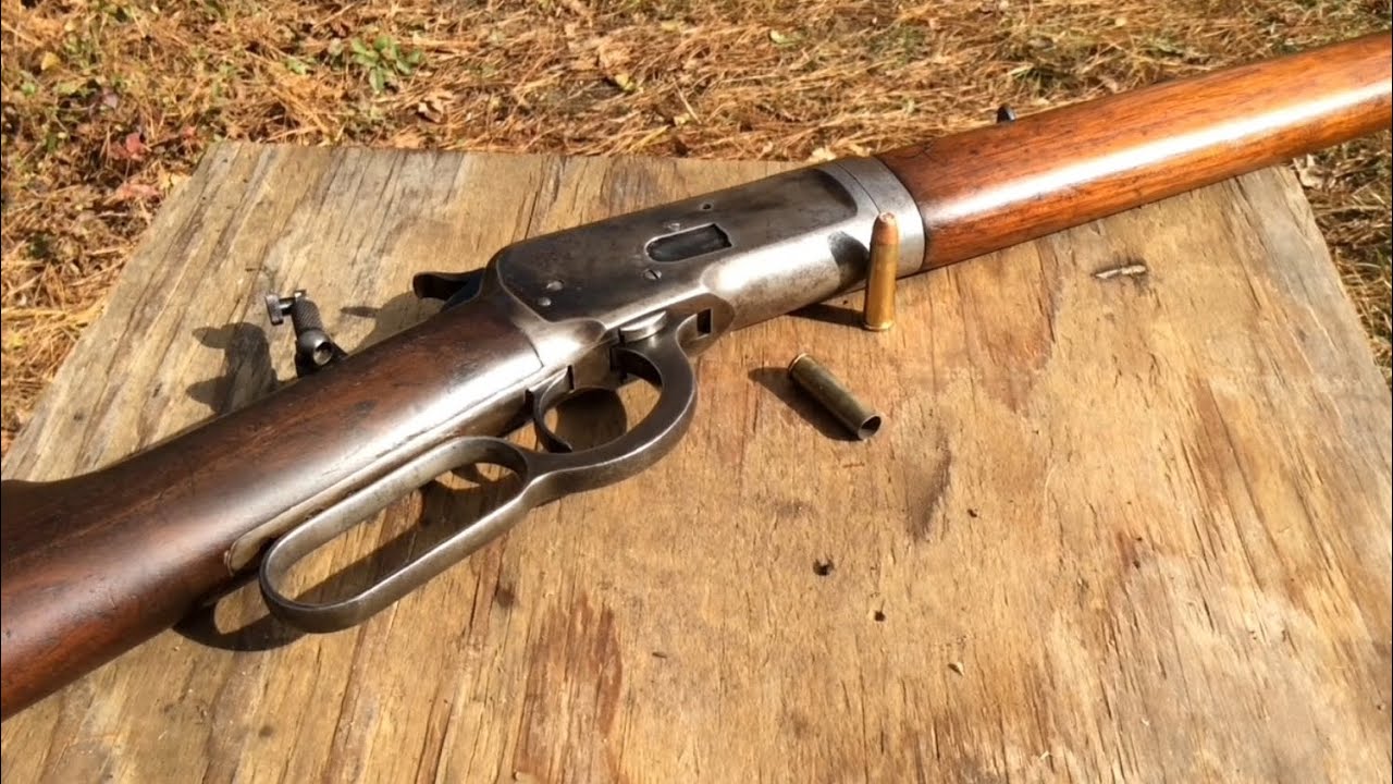 1892 Winchester in 32-20 caliber shooting an exploding target and splitting a bullet on a sword