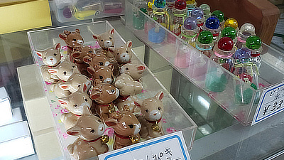 Ceramic deer figures in a shop.