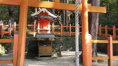 A shrine with a bell-pull.