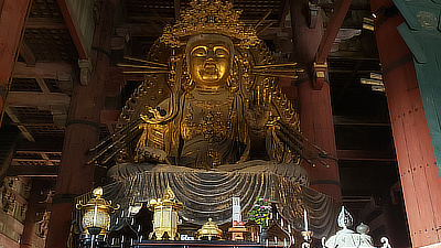 Front view of the left-side Buddha statue.