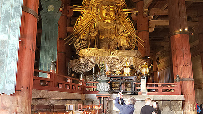 The right-hand statue of Buddha, flanking the main statue.