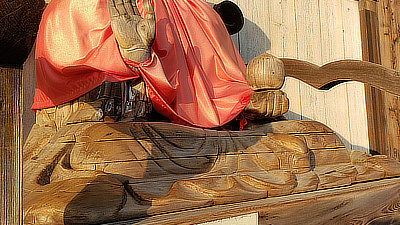 A statue of Jizo Bodhisattva, who is the embodiment of the Bodhisattva Vow, the aspiration to save all beings from suffering.