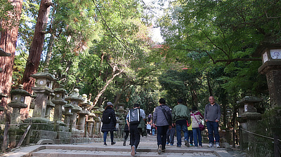 People walking up sone steps and a stranger with a nice smile.