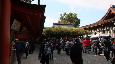 People gathered inside a courtyard of the shrine.