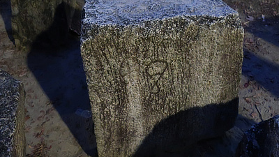 A name etched into one of the castle rocks.