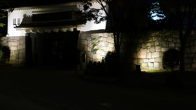 One of the gates surrounding Osaka Castle Park, at night.