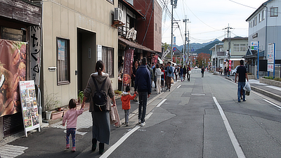 Walking down the street.