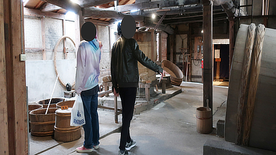 John and Deven looking at the barrels.