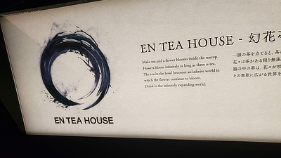A sign for the En Tea house.