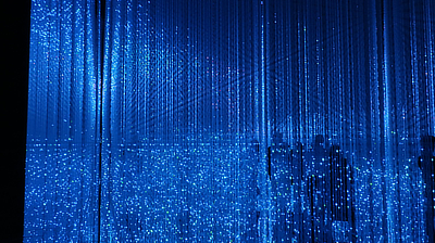 Blue lights signify a rain effect in the "Wander through the Crystal World" exhibit.