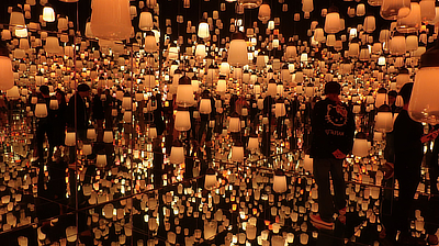 John wanders through the "Forest of Lamps" exhibit.
