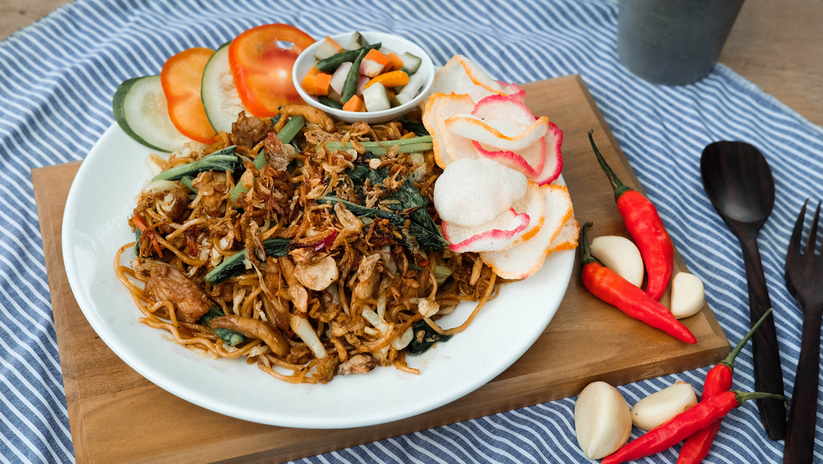 Plate of indonesian mie goreng fried noodles 
