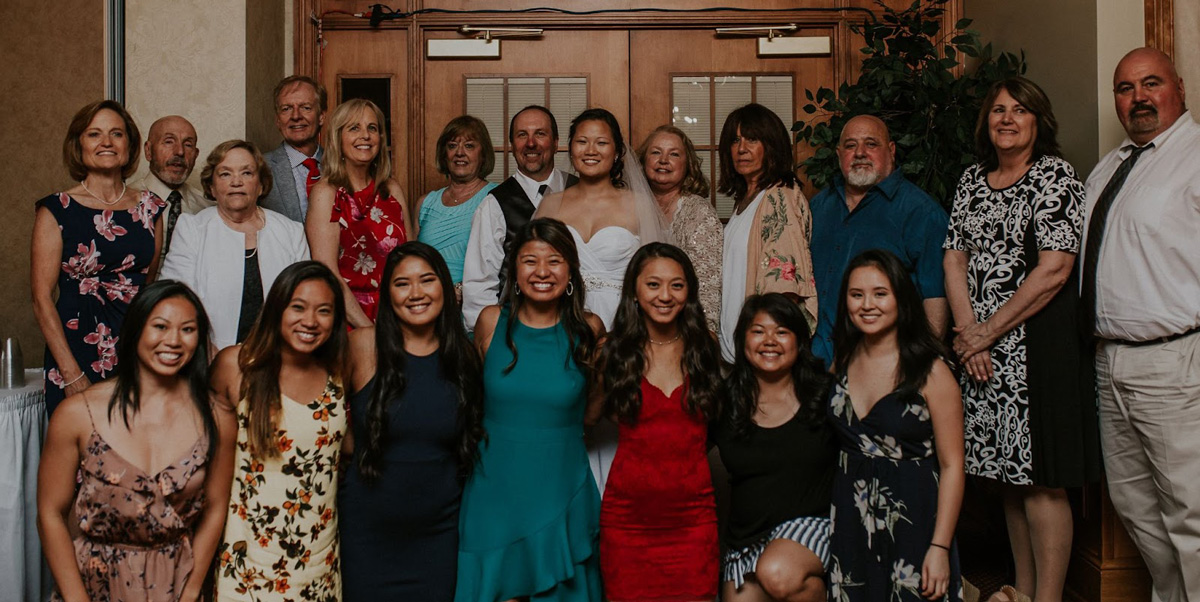 Ashley at her wedding in 2018 with friends