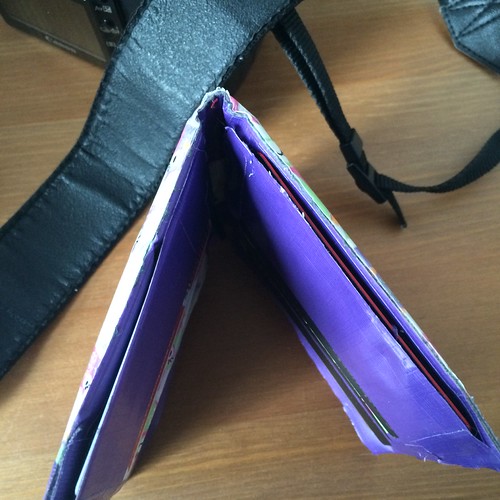 A duct tape wallet turned upside down to show where it's splitting at seams.