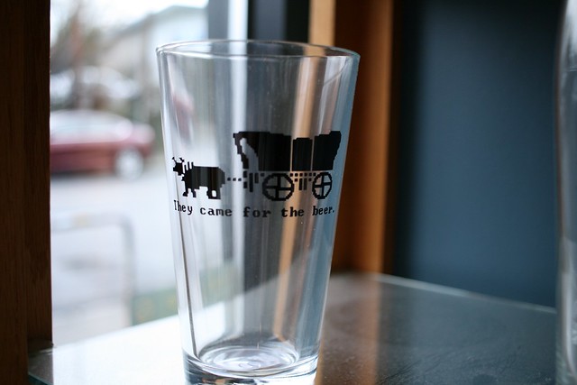 A shaker pint with an image from the old video game 