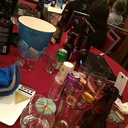 Not an atypical view at Beer Bloggers Conference. Lots of bottles and cans, glasses, a dump bucket, coasters, and computers.