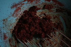 Making chile-chile paste.