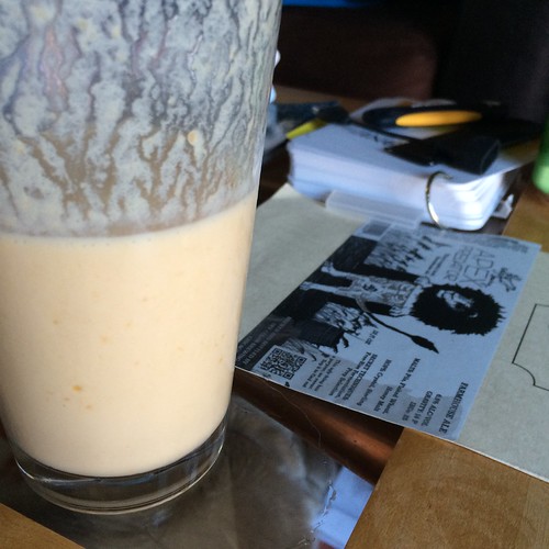 A smoothie, half consumed, on my coffee table. Half-full? Half-empty? I don't know. It's fully delicious, though.