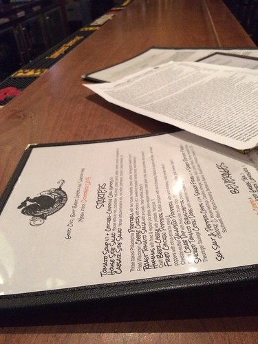 A close up of Jerry's menus on a bar.