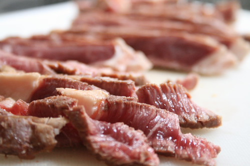 Rare, cold, sliced steak.